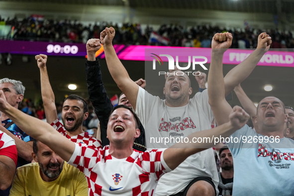 Fans of team Croatia celebrate after won the match and qualify to round 16 at the FIFA World Cup Qatar 2022 Group F match between Croatia an...