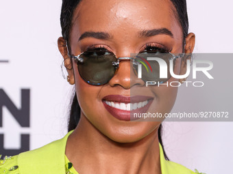 American singer and songwriter H.E.R. (Gabriella Sarmiento Wilson) arrives at the L'Oreal Paris' Women Of Worth Celebration 2022 held at The...