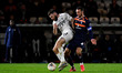 Liam Hogan (Captain) of Oldham Athletic  battles for possession with Danny Newton of Boreh...