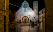 Artist lights in front of the Co-cathedral of Maria Assunta in Ruvo di Puglia on December...