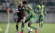 Porto's Portuguese midfielder André André (L) in action with CD Tondela's Angolan forward...