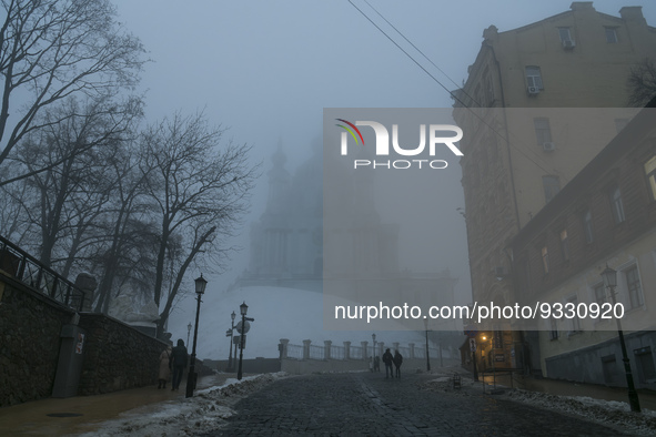 St Andrew church in historical part of Kyiv during heavy fog and power outage after a massive Russian missile attack on Ukrainian power infr...