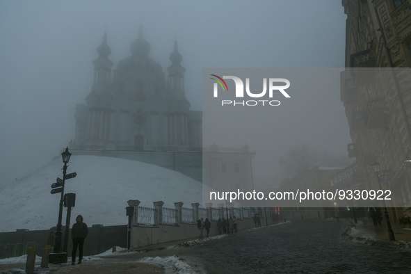 St Andrew church in historical part of Kyiv during heavy fog and power outage after a massive Russian missile attack on Ukrainian power infr...