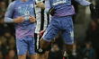 Jamal Lowe of Bournemouth  and Jonjo Shelvey of Newcastle United  go for the ball during t...