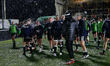 Falcons players finish their warm-up on a wet night before the Gallagher Premiership match...