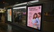 A bus stop abri is seen with a poster warning women about the effects of drinking alcohol...