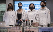 From Left to Right, Tiki Wong Honorary Secretary of the Cathay Pacific Airways Flight Atte...