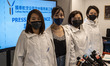 From Left to Right, Tiki Wong Honorary Secretary of the Cathay Pacific Airways Flight Atte...
