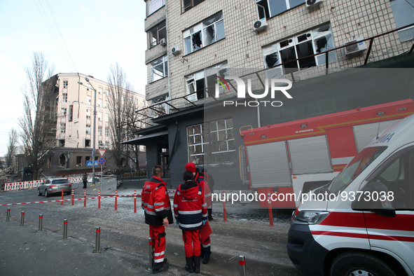 KYIV, UKRAINE - DECEMBER 31, 2022 - Paramedics stay near the hotel in the Pecherskyi district that was damaged in a Russian missile attack o...