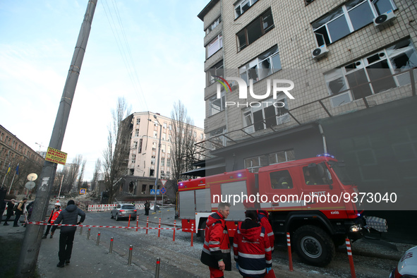 KYIV, UKRAINE - DECEMBER 31, 2022 - Paramedics stay near the hotel in the Pecherskyi district that was damaged in a Russian missile attack o...