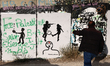 A person is seen near the Israeli West Bank Barrier in Bethlehem, Palestinian Territories...