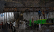 Labourers working at construction site on Srinagar Jammu Highway in Jammu and Kashmir Indi...