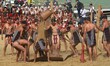 Naga tribesman from Yimchunger tribe performs a traditional Millet Harvest play on the thi...