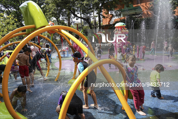 Children play in the water during the National Children's Day event inside children's museum in Bangkok, Thailand, 14 January 2023. Children...