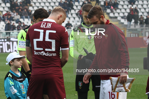 Torino defender Kamil Glik (25) and Roma midfielder Daniele De Rossi (16) before the Serie A football match n.15 TORINO - ROMA on 05/12/15 a...