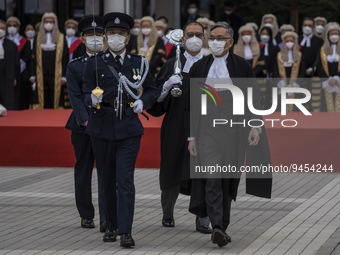 (Right) Hong Kong Chief Justice, Andrew Cheung Kui-nung escorted by a police officer inspecting a Ceremonial Guard during the Ceremonial Ope...