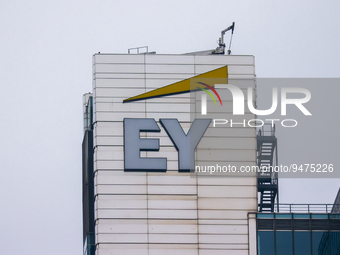 EY logo is seen on a building in Warsaw, Poland on January 19, 2023. (