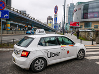 Uber taxi car is seen in the center of Warsaw, Poland on January 19, 2023. (