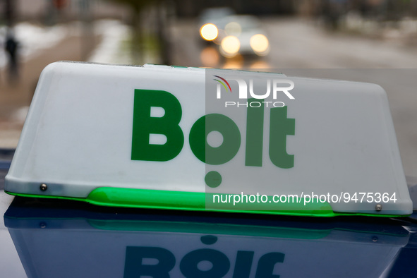 Bolt taxi sign is seen on a car in Bialystok, Poland on January 21, 2023. 