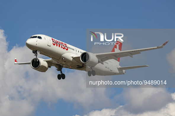 Swiss Airbus A220-300 aircraft or former Bombardier CS300 BD-500 model, as seen on final approach flying for landing at the runway of London...
