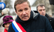 Nicolas Dupont-Aignan, deputy and president of the party Debout La France is present at a...