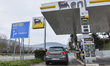 A car is seen in a closed gas station in L'Aquila, Italy, on January 25, 2023. On january...
