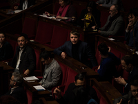 NUPES deputy Louis Boyard among the opposition benches, during the question session to the government, in Paris, Tuesday 24 January, 2023. (