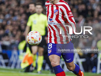 Antoine Griezmann of Atletico de Madrid in action during the Copa del Rey match between Real Madrid and Atletico de Madrid at Estadio Santia...