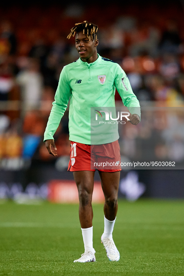 Nico Williams of Athletic Club looks on prior to the Copa del Rey Quarter Final match between Valencia CF and Athletic Club at Mestalla stad...