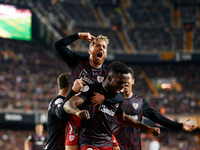 Iker Muniain (L) of Athletic Club celebrates after scoring their side's first goal with his teammate Iaki Williams (R) during the Copa del R...