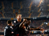 Iker Muniain (L) of Athletic Club celebrates after scoring their side's first goal with his teammate Iaki Williams (R) during the Copa del R...