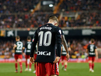 Iker Muniain of Athletic Club celebrates after scoring their side's first goal during the Copa del Rey Quarter Final match between Valencia...