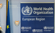 A WHO banner is seen in the room, Nicosia, Cyprus, on Jan. 27, 2023. The Signing of an Agr...