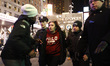 A woamn is arrested as people demonstrate in Times Square as the beating video of Tyre Nic...
