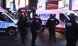 NYPD officers are seen followiing several arrests during a demonstration for the release o...