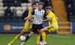 Matt Palmer of Notts County under pressure from Jamie Cooke of FC Halifax Town and Jack Hu...