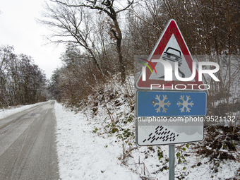 A snow road sign is seen after a snowfall in L'Aquila, Italy, on January 23, 2023. Central Italy is involved in a bad weather wave which is...