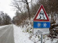 A snow road sign is seen after a snowfall in L'Aquila, Italy, on January 23, 2023. Central Italy is involved in a bad weather wave which is...
