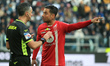 Armando Izzo (AC Monza) disputes with referee of the match Gianluca Aureliano during the i...