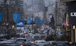 Vehicles drive along an avenue in northern Tehran at sunset, January 30, 2023. Since the I...