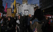 At mid-day, thousands of Londoners gathered in the streets of the capital. Among them teac...