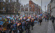 At mid-day, thousands of Londoners gathered in the streets of the capital. Among them teac...