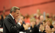 former President of Germany Gerhard Schröder (SPD) walk back to his chair at the SPD Feder...