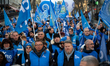 Demonstrators from the CFTC (French Confederation of Catholic Workers) union take part in...