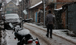 A man walks amid snowfall in sopore District Baramulla Jammu and Kashmir India on 09 Febru...