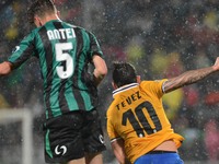 Antei and Tevez during the Serie A football match between Sassuolo and Juventus at MAPEI stadium in Reggio Emilia, Italy, on April 28, 2014....