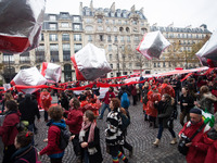 Climate demonstrators play with inflatible cubes with red lines symbolizing planetary boundries during the D12 demonstrations during the las...