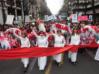 Guardian angels of the climate holds up a red line symbolizing panetary boundries in front of estimated 15,000 demonstrators who marsched fr...