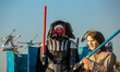 A giant paper-mache carnival representing Star Wars and Darth Vader as Bin Laden,  float m...