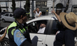 Motorists insult protesters a block away from the Mexico City Judiciary, who demand justic...